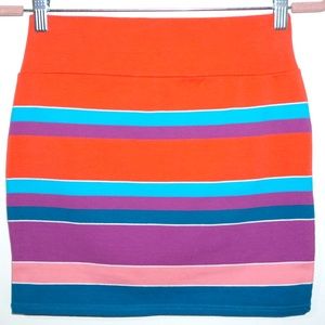 Cotton On orange and rainbow striped mini spandex skirt. Size S.